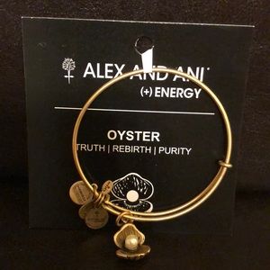 Auth Alex and Ani gold tone Oyster bracelet